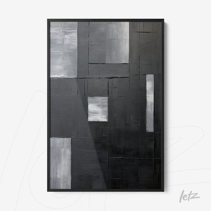abstract wall art in black and white featuring geometric shapes on textured background with black frame