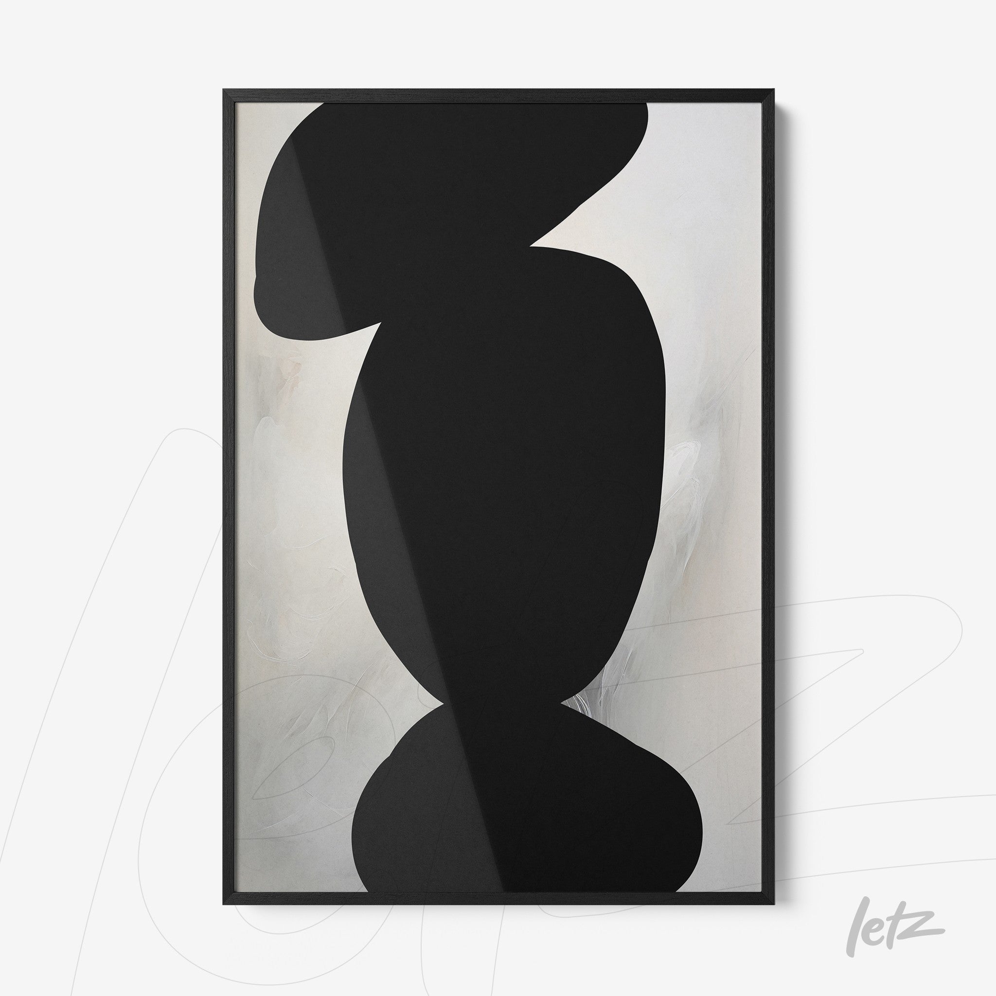 modern framed wall art featuring abstract black shapes on a light background with a thin black frame