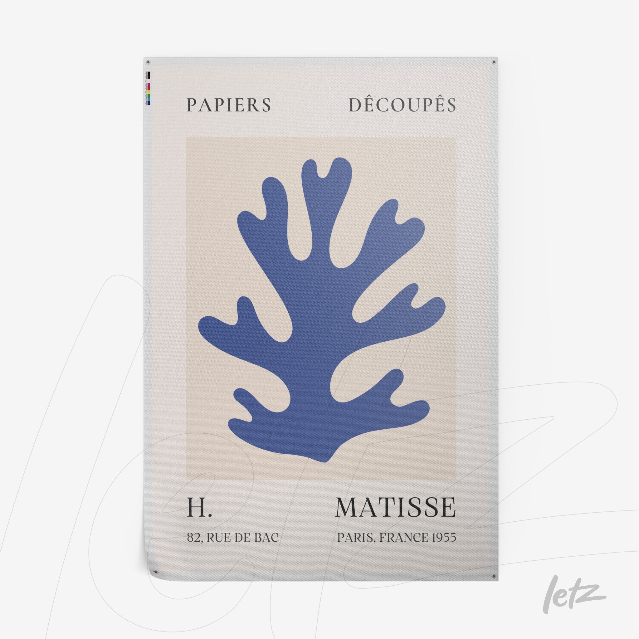 framed wall art featuring a stylized blue sea plant on a light background with decorative text at the bottom