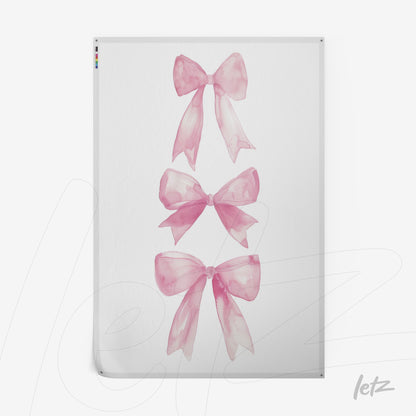 artwork featuring pink bow illustrations on a white background