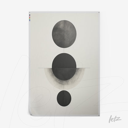 abstract wall art featuring black and white geometric circles on a light background