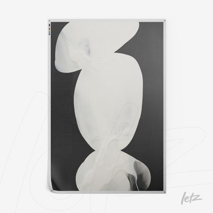 abstract wall art in shades of white and black featuring fluid shapes on a dark background