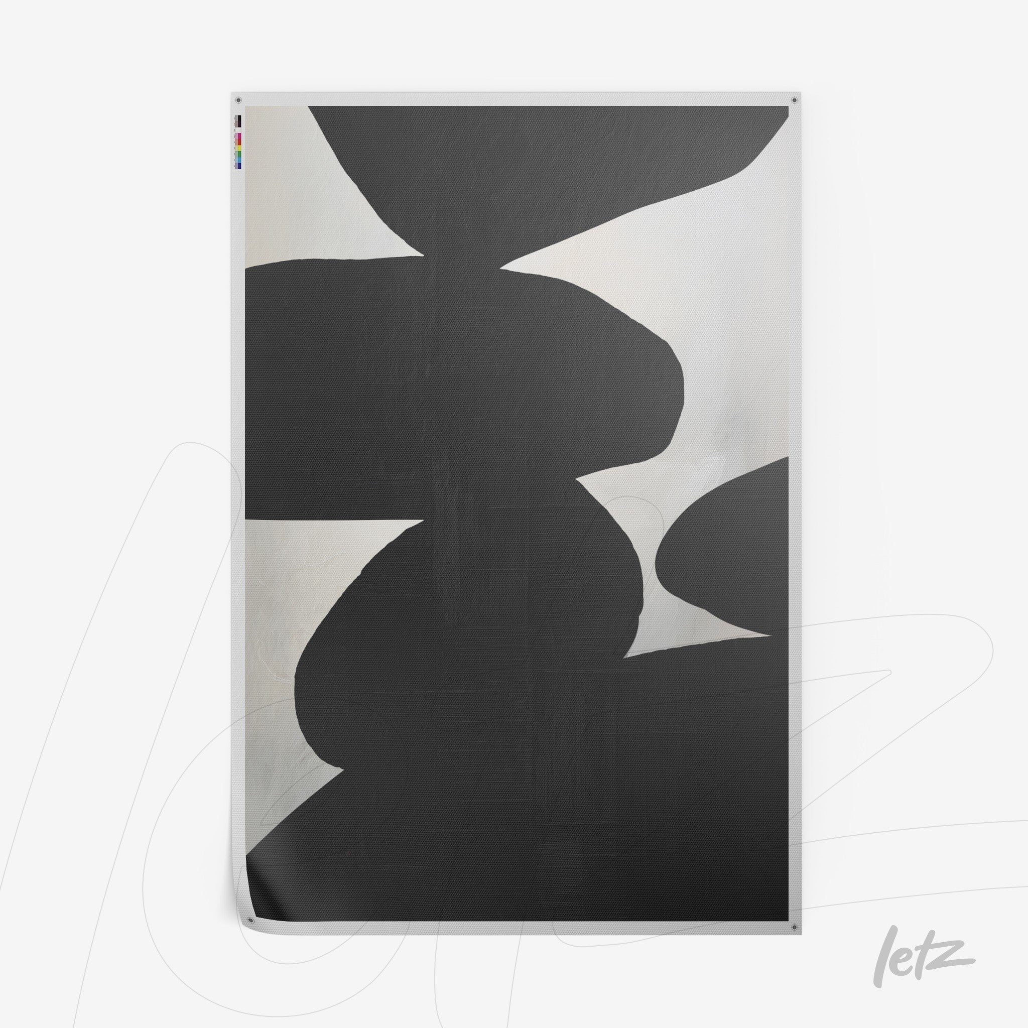 abstract wall art in black and white featuring organic shapes on a light background