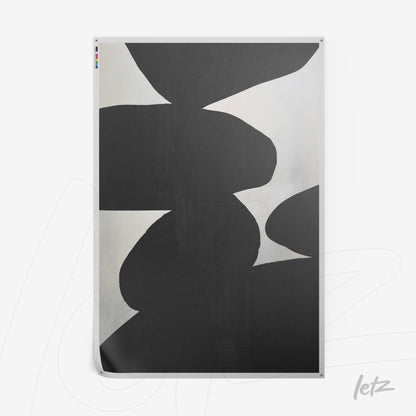 abstract wall art in black and white featuring organic shapes on a light background