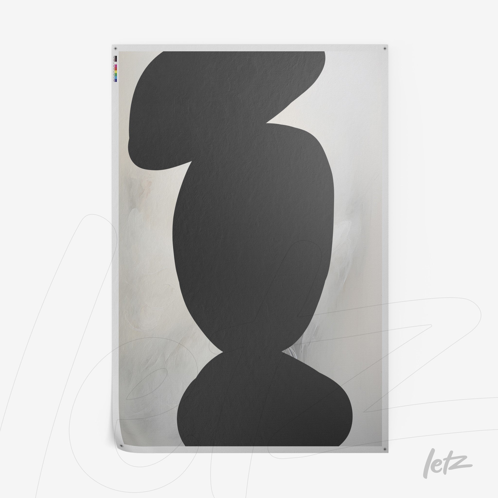 abstract wall art in black on a light background with soft textures