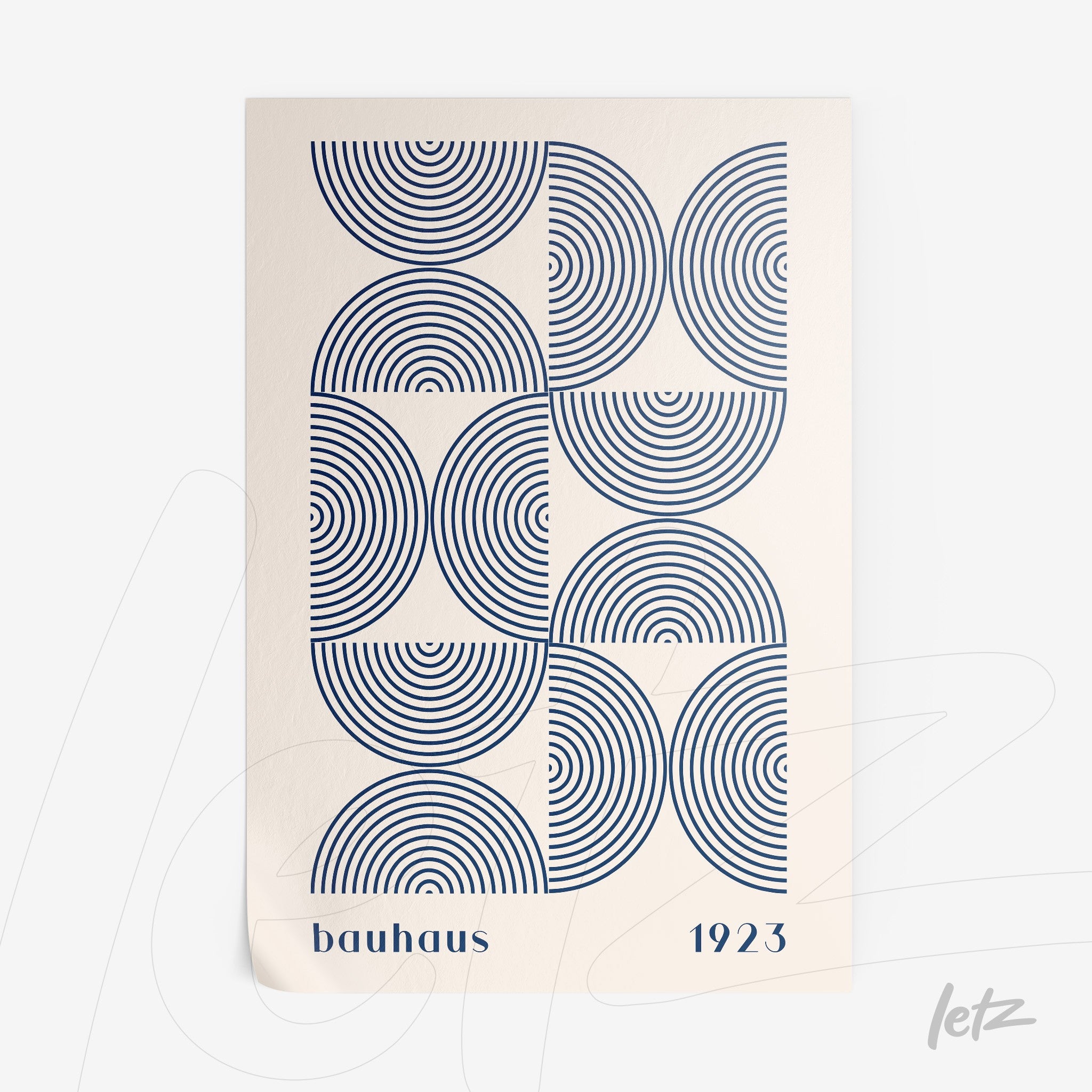 poster featuring geometric design of blue concentric circles on beige background with text 'bauhaus 1923'
