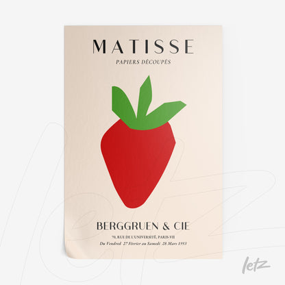 framed wall art featuring a vibrant paper cutout of a stylized strawberry on a light background with elegant typography