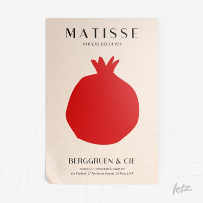 framed wall art featuring a modern illustration of a red pomegranate in minimalist style against a light background with vintage typography