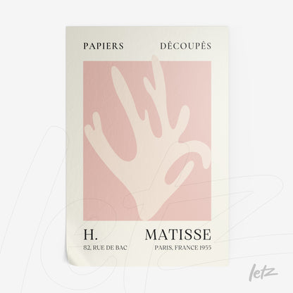 framed wall art featuring a stylized hand on a soft pink background with white frame and bold black typography