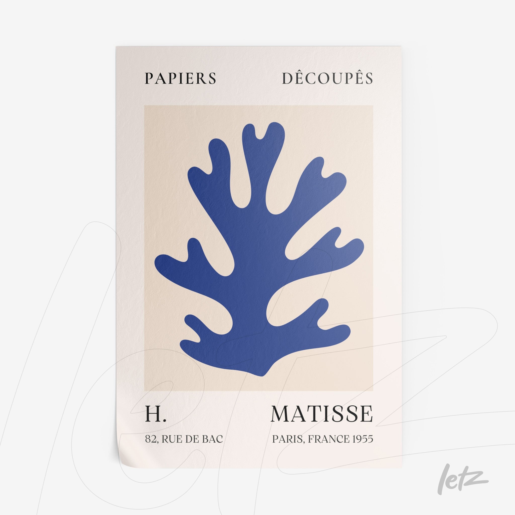 framed wall art inspired by cut paper designs of Matisse featuring a blue coral shape on a light background