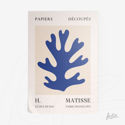 framed wall art inspired by cut paper designs of Matisse featuring a blue coral shape on a light background