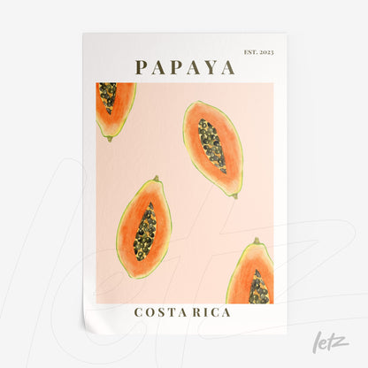 framed artwork featuring illustrations of papaya slices on a pink background with stylized text